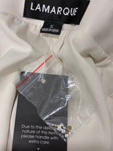 Load image into Gallery viewer, NWT Pati Rhinestone Mini Skirt