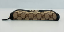 Load image into Gallery viewer, Monogram Sukey Zip Around Wallet