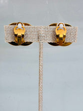 Load image into Gallery viewer, Vintage 96A Gold Turnlock Clip On Earrings
